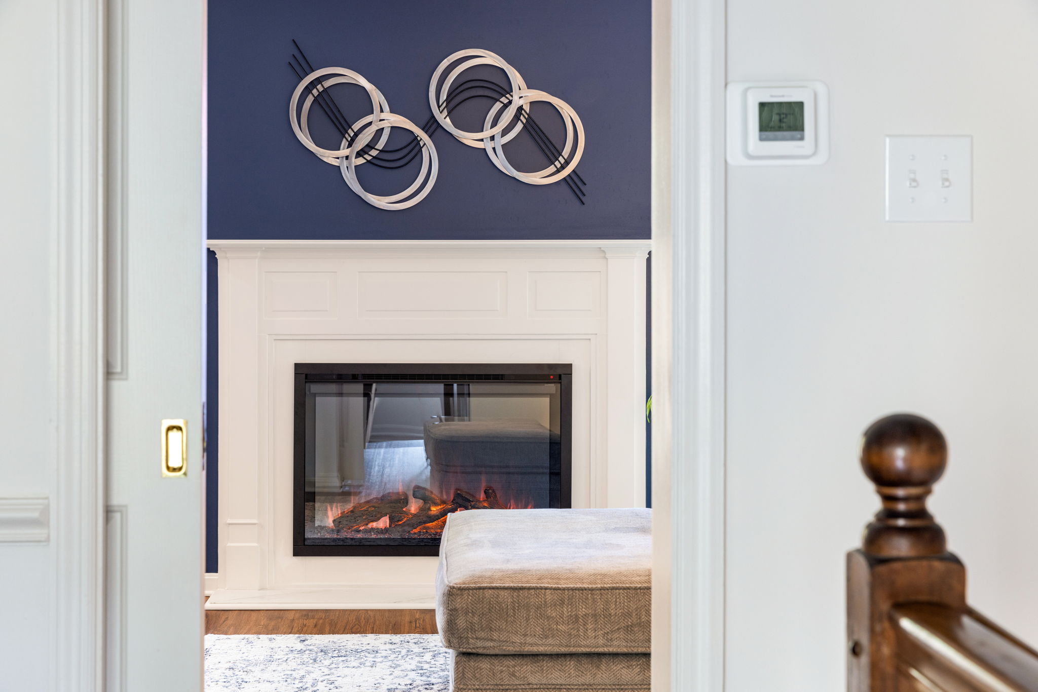 Custom electric fireplace mantle installation