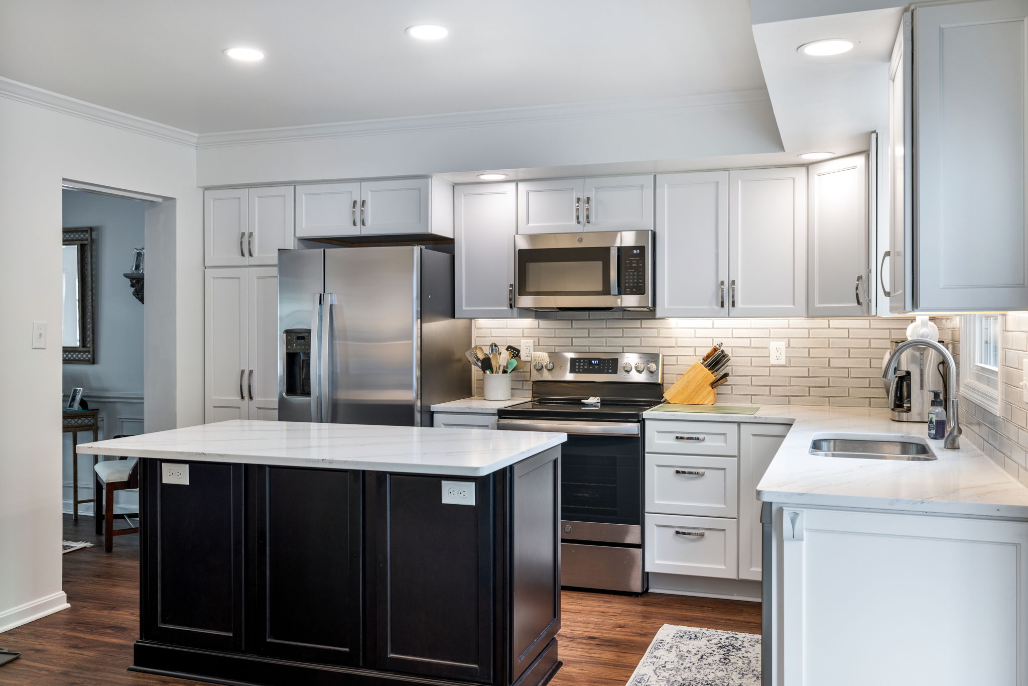 Custom kitchen cabinet installation with quartz countertops