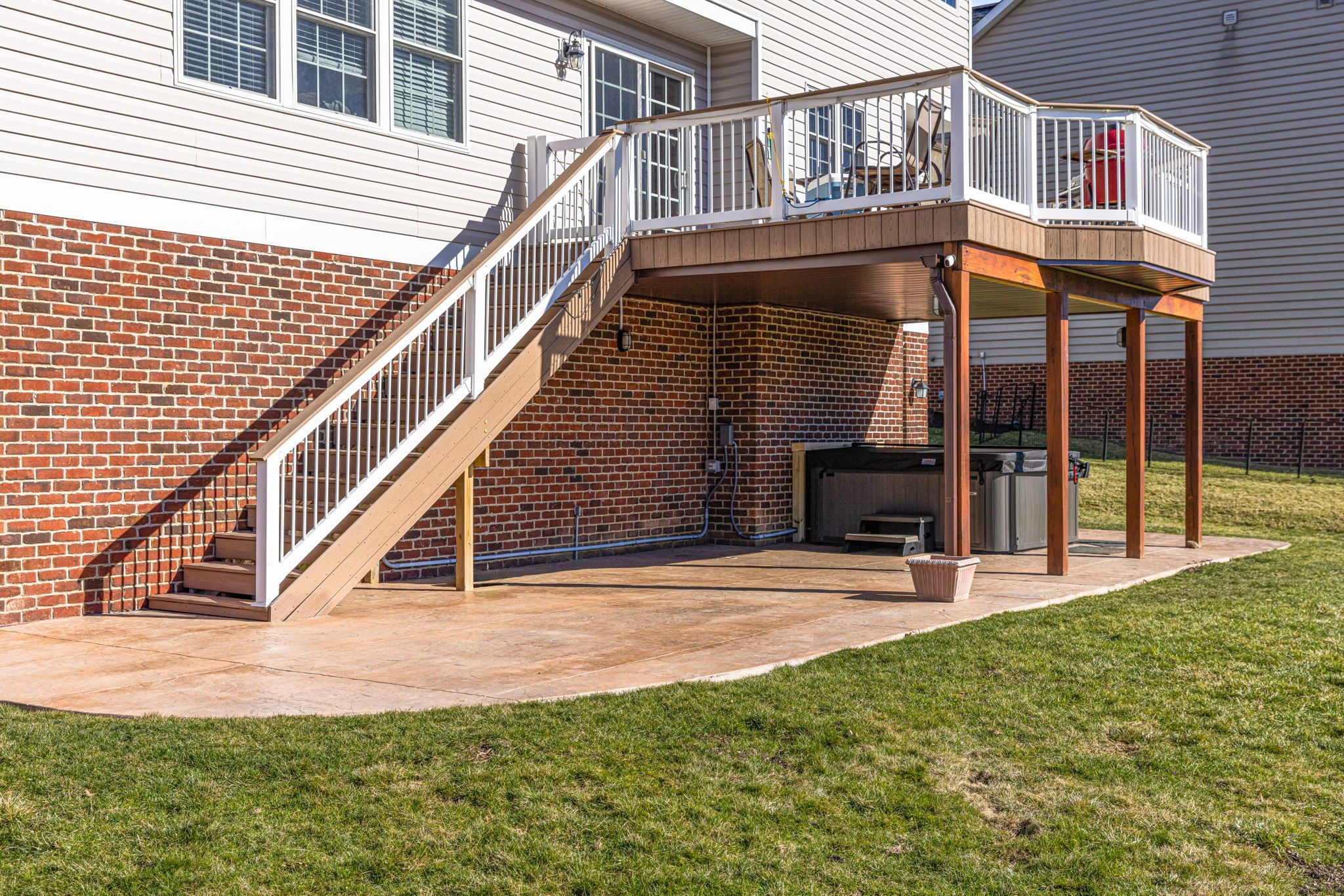 Stamped concrete patio with deck and pergola Pittsburgh