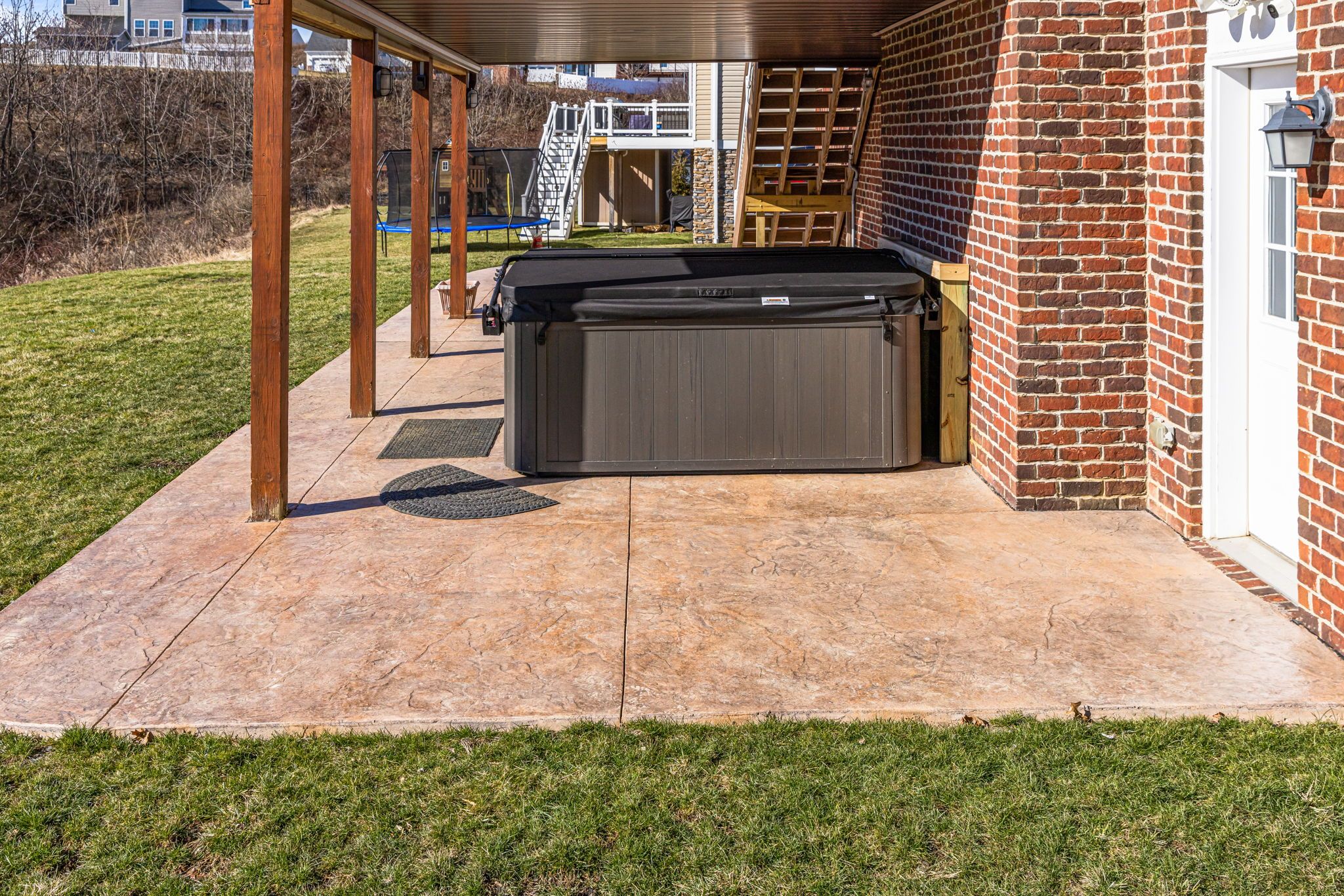 Stamped concrete patio with hot tub Pittsburgh