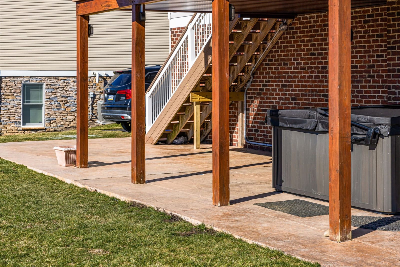 Stamped concrete patio with pergola in Pittsburgh